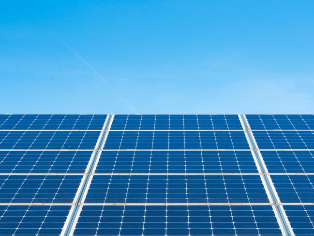 Photo of solar panels and blue sky