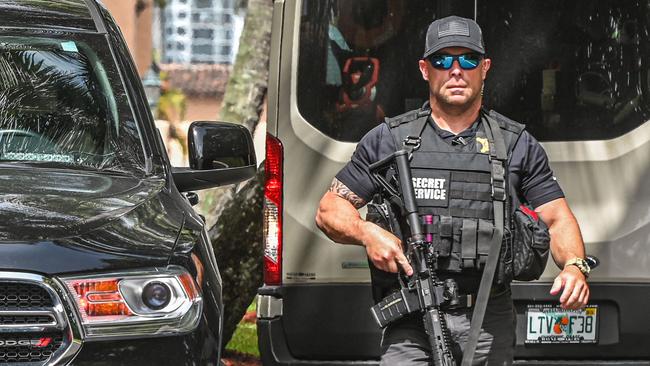 A Secret Service agent outside Mar-a-Lago, which was raided by the FBI. Picture: AFP