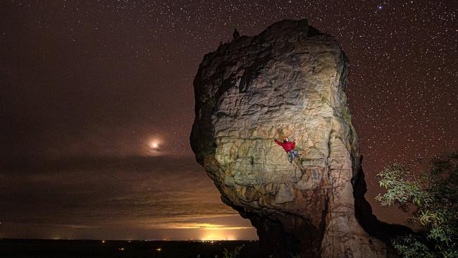 Tom Perkins climbs Castle Crag in Victoria’s Grampians National Park, which will be subject to bans in many areas under a draft management plan. Picture: Jason Edwards