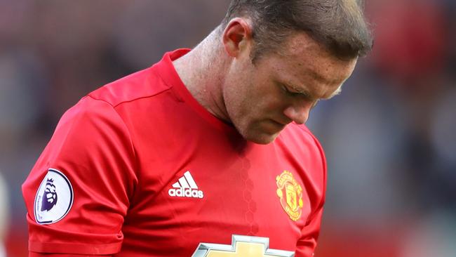 Wayne Rooney of Manchester United shows dejection.