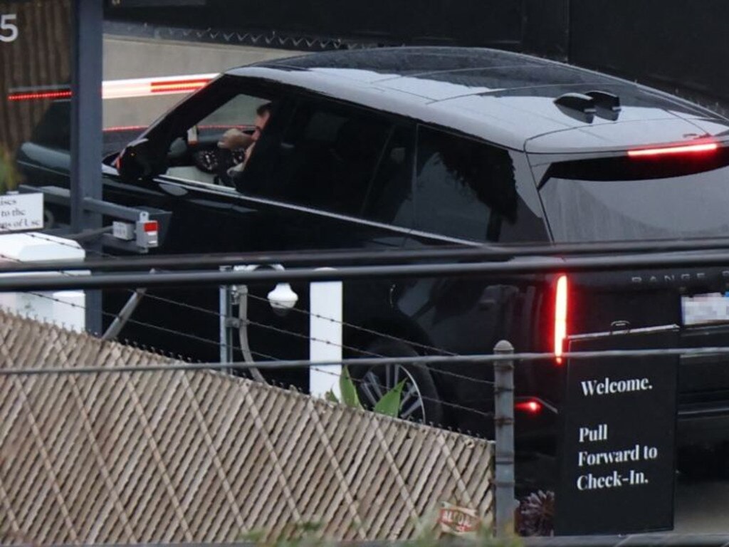 Harry arrived at LAX in a black Range Rover (Backgrid).