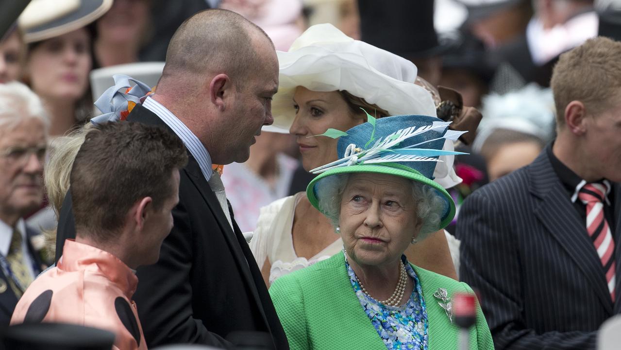 Queen Elizabeth II talks to trainer Peter Moody and jockey Luke Nolan after victory by Australian racehorse Black Caviar, in winning the Diamond Jubilee Stakes at Royal Ascot Racecourse, Ascot in England, 23/06/2012.