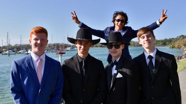 Suncoast Christian College students and parents gather at La Balsa Park for photos ahead of the formal at The Events Centre, Caloundra.