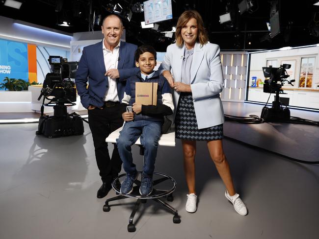 The Morning Show hosts Larry Emdur and Kylie Gillies with Adit Garg, 10, as they announce the launch of the 2024 Kids News Junior Journo Newsroom competition. Adit won the inaugural Primary News Story (Video) category in 2023. Picture: Richard Dobson