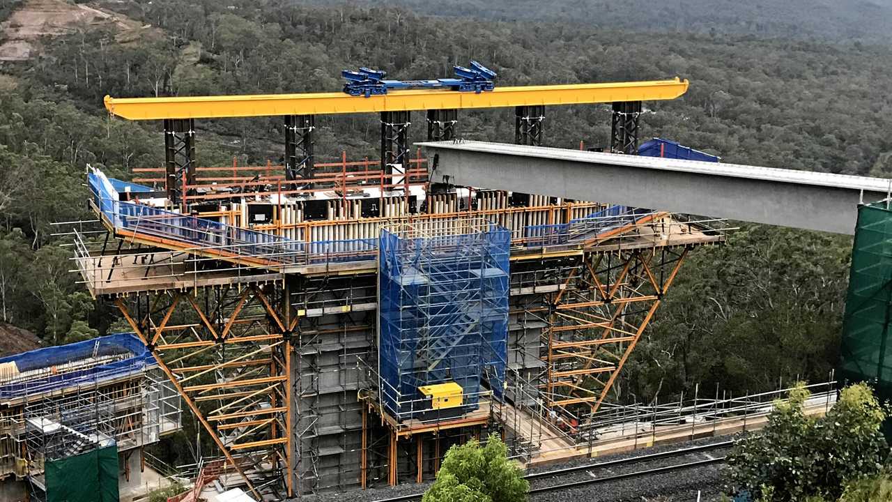 The first Super T girder launched and placed in the viaduct on the Toowoomba Second Range Crossing.