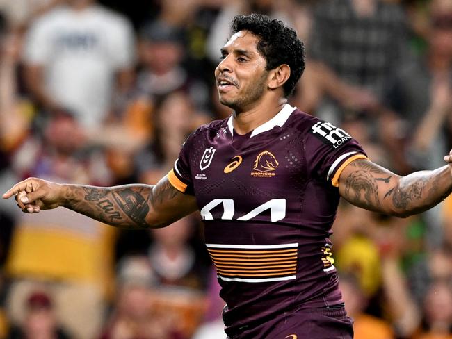 BRISBANE, AUSTRALIA - MARCH 11: Albert Kelly of the Broncos celebrates scoring a try during the round one NRL match between the Brisbane Broncos and the South Sydney Rabbitohs at Suncorp Stadium, on March 11, 2022, in Brisbane, Australia. (Photo by Bradley Kanaris/Getty Images)