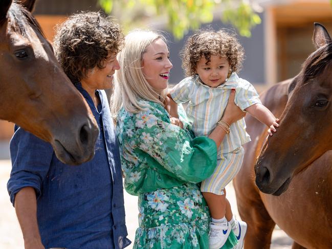 Angela Ceberano and her husband Phil Ceberano with their son James-Henry. Picture: Jason Edwards