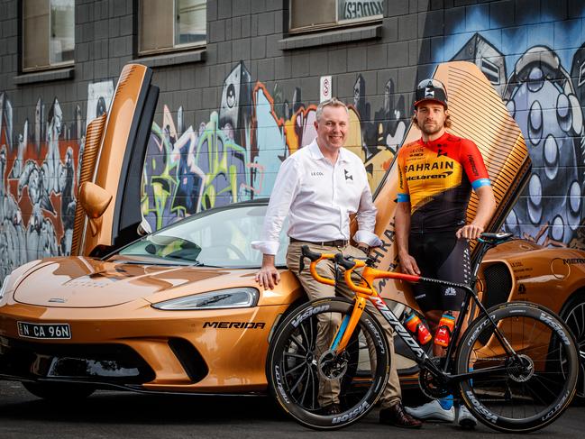 20/1/2020 Team Bahrain Mclaren director John Allert and rider Marco Heller with a McLaren in Adelaide. Picture MATT TURNER.