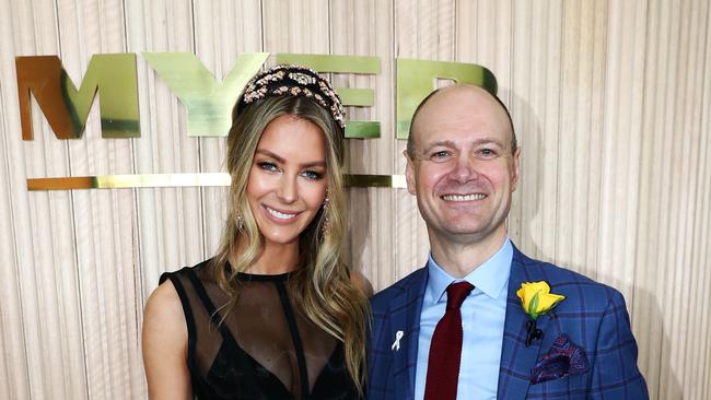 La Cage aux Folles: Myer chief executive Richard Umbers with Jennifer Hawkins in the Myer marquee in the birdcage. Picture: Aaron Francis