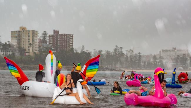 The Manly Inflatable Boat Race at Shelley Beach, Manly, NSW. Sunday 17th March 2019. (AAP IMAGE/Jordan Shields)