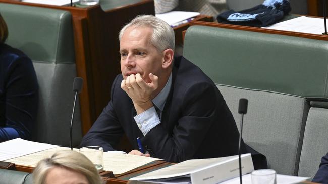 Immigration Minister Andrew Giles, wondering what the next headache will be. Picture: NewsWire / Martin Ollman