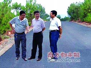 China: In June 2011, the Chinese government posted several photos of "County mayor Li Ningyi and vice-mayor Tang Xiaobing inspecting the newly constructed country road at Lihong Town including this levitating beauty.