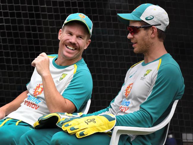 Australian cricketers David Warner and captain Tim Paine. Picture: AFP