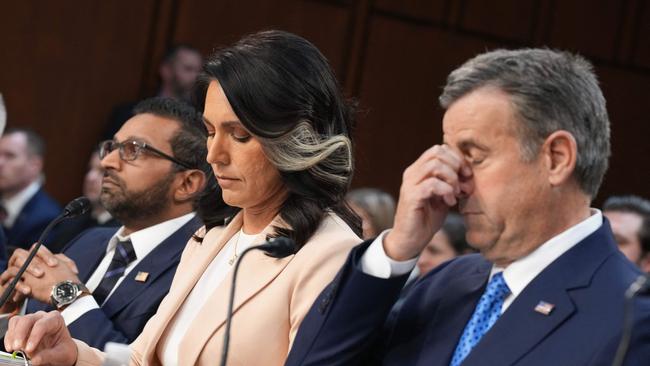 WASHINGTON, DC - MARCH 25: (L-R) FBI Director Kash Patel, Director of National Intelligence Tulsi Gabbard, and Central Intelligence Agency Director John Ratcliffe, appear during a Senate Committee on Intelligence Hearing on March 25, 2025 in Washington, DC. The hearing to examine worldwide threats comes a day after Jeffrey Goldberg, the editor-in-chief for The Atlantic magazine was inadvertently included on a high level Trump administration Signal group chat on bombing plans in Yemen on Houthi targets.   Andrew Harnik/Getty Images/AFP (Photo by Andrew Harnik / GETTY IMAGES NORTH AMERICA / Getty Images via AFP)