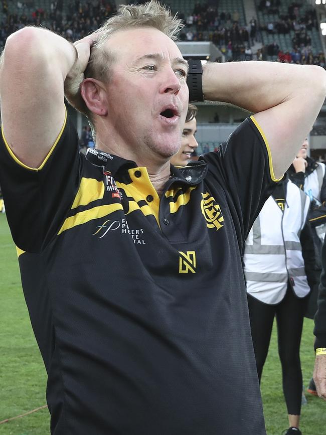 Glenelg coach Mark Stone shows his delight at the club breaking a 33-year flag drought. Picture: SARAH REED.