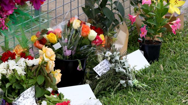 A wall of memorial flowers outside the Tara Police station on Tuesday. Picture: NCA NewsWire/ David Clark