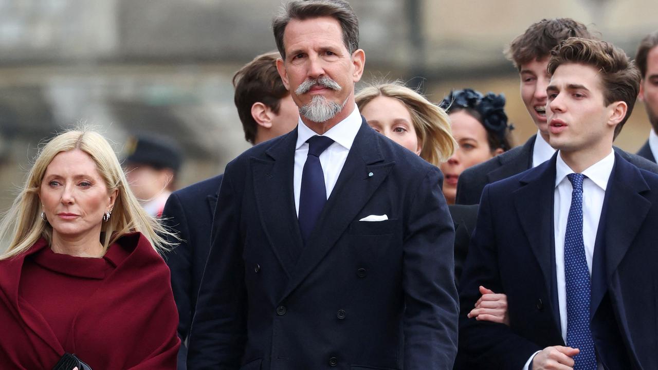 Greece's Crown Prince Pavlos (C) and Greece's Crown Princess Marie-Chantal (L) arrive to attend a thanksgiving service for the life of King Constantine of the Hellenes, at St George's Chapel at Windsor Castle on February 27, 2024. (Photo by Chris Jackson / POOL / AFP)
