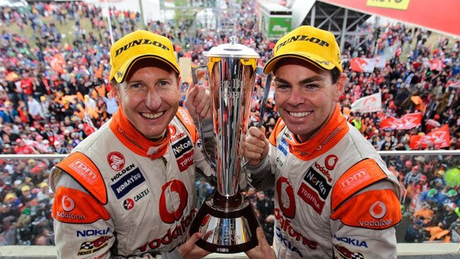 Craig Lowndes and Mark Skaife celebrate Bathurst glory in 2010.