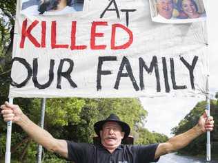 Gavin Aylward protests the meeting of the AAT outsite Novotel Twin Waters. His daughter Korrine Aylward was murdered by Turkish National Mustafa Kunduraci who would have been deported before the murder had the forerunner to the AAT not overturned the deportation decision. Picture: Lachie Millard