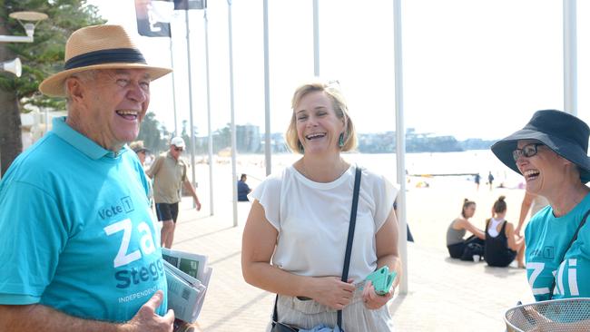 Mr Abbott is been made favourite to beat Zali Steggall, pictured campaigning with father Jack Steggall in Manly Picture: AAP Image/Jeremy Piper