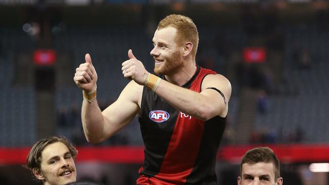 Adam Cooney gets chaired off after game 250 for the Bombers. Pic: Michael Klein