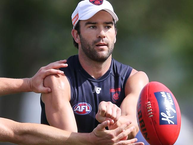 MELBOURNE, AUSTRALIA - DECEMBER 05: Jordan Lewis of the Demons runs with the ball during a Melbourne Demons AFL training session at Gosch's Paddock on December 05, 2018 in Melbourne, Australia. (Photo by Michael Dodge/Getty Images)