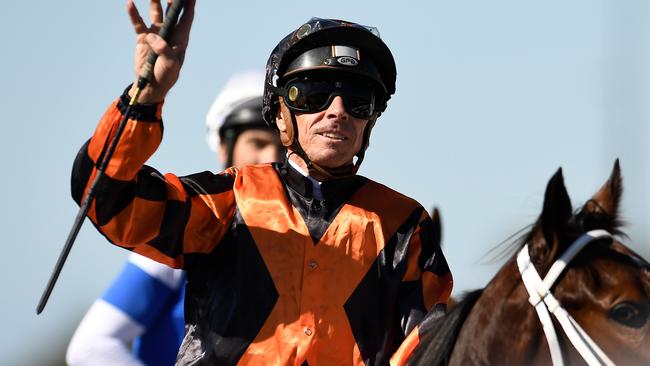 Jockey Michael Cahill says his moon boot is what caused him to tumble down the stairs. Picture: AAP Image/Albert Perez