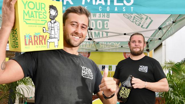 Jake Black and Justin Swayn from Your Mates Brewery selling takeaway.