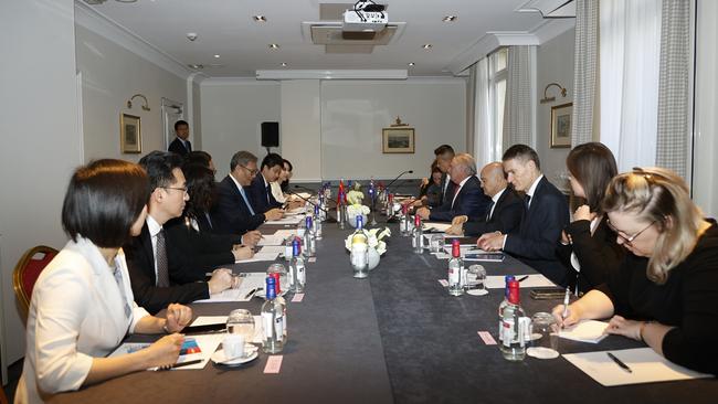 Australia’s Trade Minister Don Farrell meets his Chinese counterpart, Commerce Minister Wang Wentao, on the sidelines of the OECD.