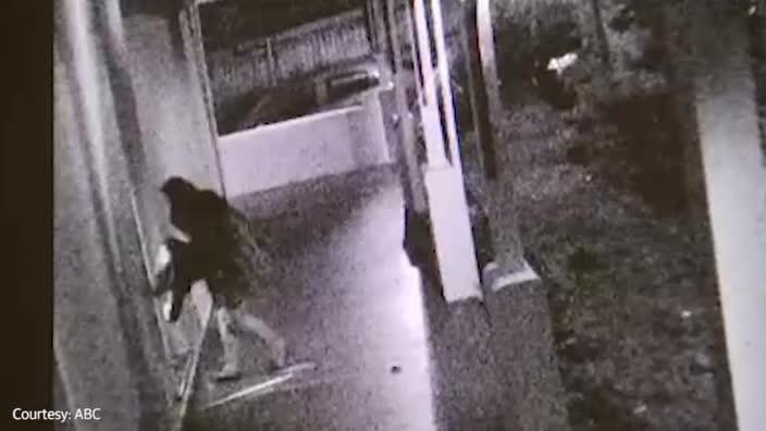 CCTV shows people sneaking in a window of Girl X's residential facility