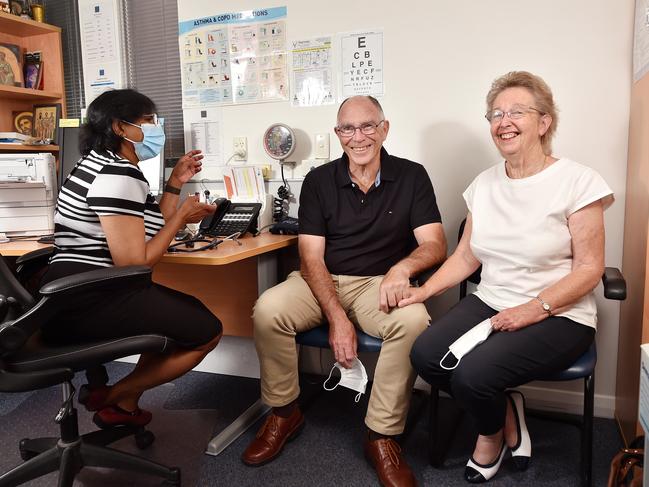 For Monday's paper.  The Hanover St Medical centre in Melbourne will be giving COVID vaccines from Monday. It has already booked out its first 100 appointments. Elderly couple Russel and Sandra Goddard, with their doctor Dr Darshika Herath. Picture : Nicki Connolly