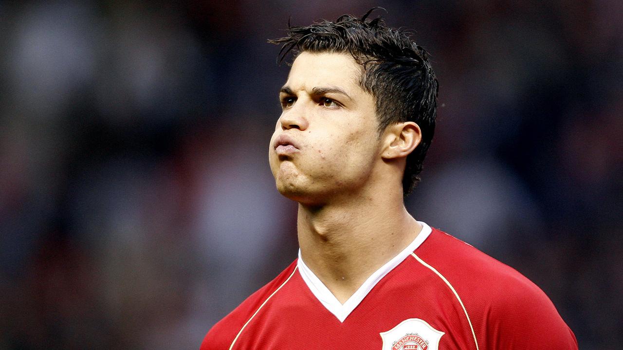(FILES) In this file photo taken on April 24, 2007 Manchester United's Portugese midfielder Cristiano Ronaldo lines up with his team mates before their European Champions League semi final first leg football match against AC Milan at Old Trafford, Manchester, north west England, 24 April 2007. - Manchester United announced on Friday they have reached a deal to re-sign Cristiano Ronaldo from Juventus, 12 years after he left Old Trafford for Real Madrid. (Photo by Andrew YATES / AFP)