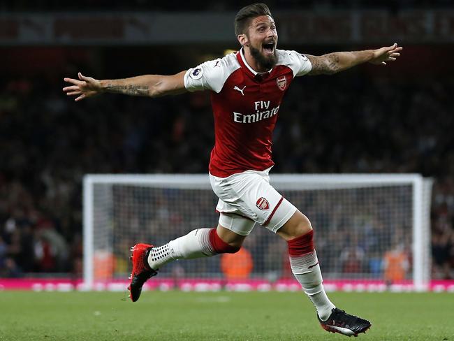 Arsenal's French striker Olivier Giroud celebrates scoring Arsenal's fourth goal.