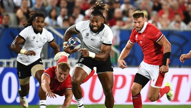 Fiji's outside centre and captain Waisea Nayacalevu runs with the ball during the France 2023 Rugby World Cup Pool C match between Wales and Fiji at Stade de Bordeaux in Bordeaux, south-western France on September 10, 2023. (Photo by Christophe ARCHAMBAULT / AFP)