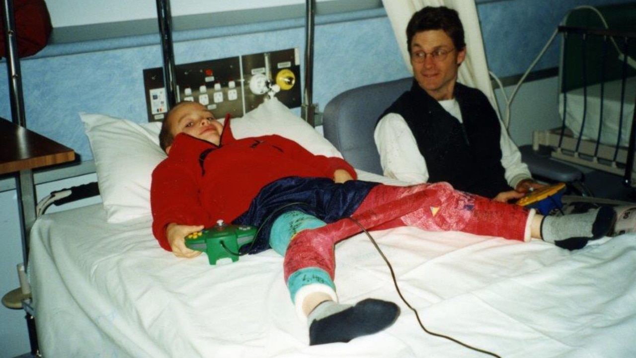 Amon in hospital as a kid with dad Marcus