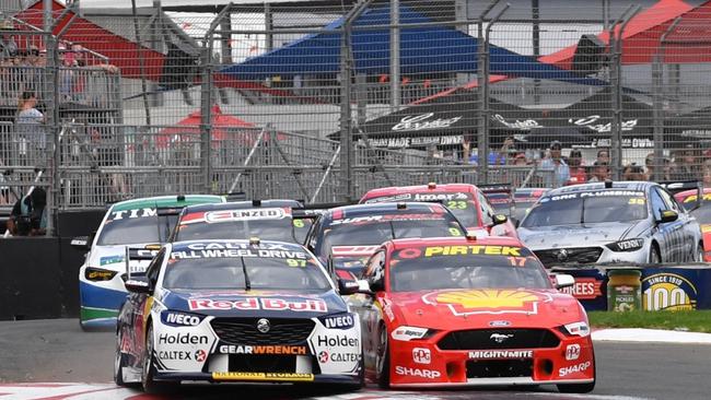 Shane van Gisbergen from Red Bull Holden Racing and Scott McLaughlin from Shell V Power Racing during the Superloop Adelaide 500 at the Adelaide Street Circuit in Adelaide, Sunday, March 3, 2019. (AAP Image/David Mariuz) NO ARCHIVING, EDITORIAL USE ONLY