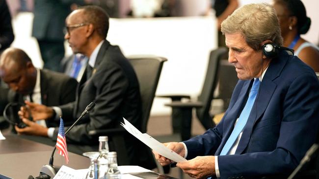 US Special Presidential Envoy for Climate John Kerry, right, at a meeting at the COP27 climate summit in Sharm el-Sheikh on Monday. Picture: AFP