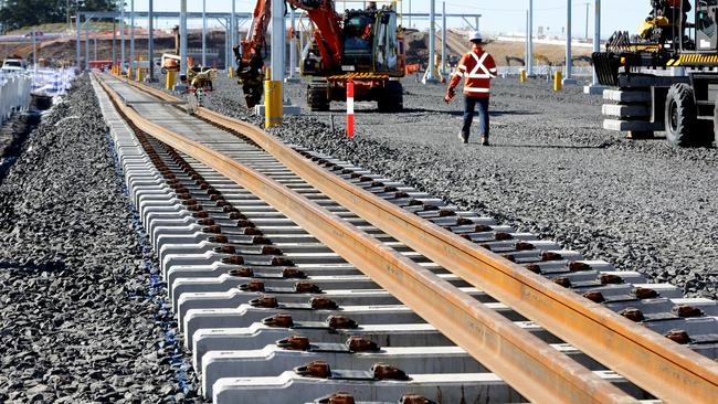 The laying of the first railway line at Cudgegogn Rd station. Picture; Peter Kelly