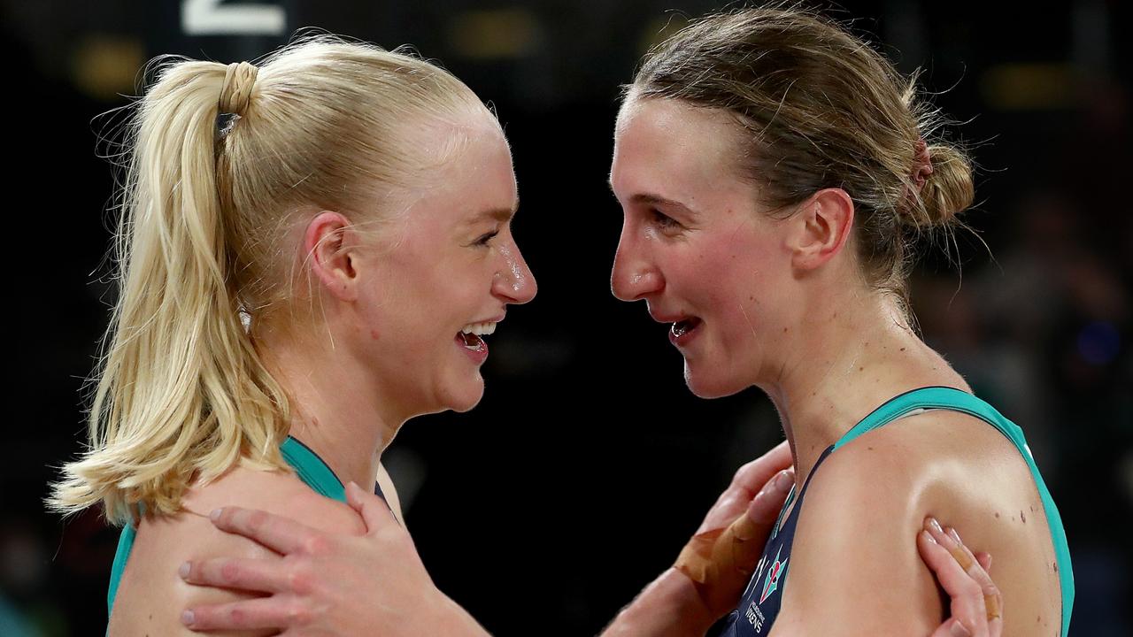Jo Weston (left) and Emily Mannix cannot believe it after a stunning defensive effort led to them winning their preliminary final against the Giants. Picture: Getty Images