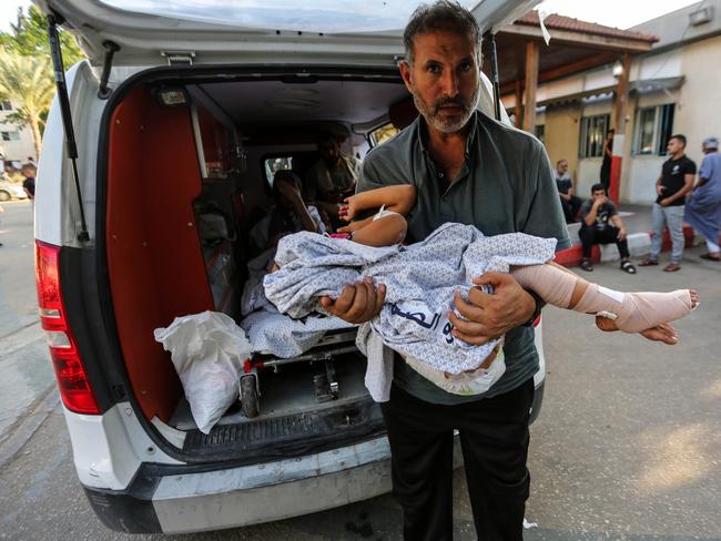 Wounded Palestinians enter the Rafah crossing to travel to receive treatment in Egypt in Rafah, Gaza. Picture: Getty Images