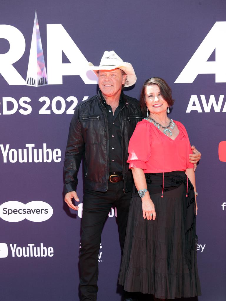 Troy Cassar-Daley and Laurel Edwards, who added a splash of colour, are enjoying another ARIAS together. Picture: NewsWire / Christian Gilles