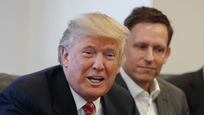 PayPal founder Peter Thiel with Donald Trump in December 2016. Picture: AP