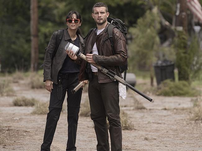 The Walking Dead: World Beyond. Felix (Nico Tortorella) and Huck (Annet Mahendru).