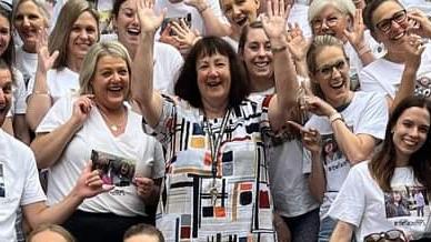 Riverside Primary School staff farewelling long-serving principal Jane Bovill (centre) with T-shirts honouring the departed leader. Picture: Supplied