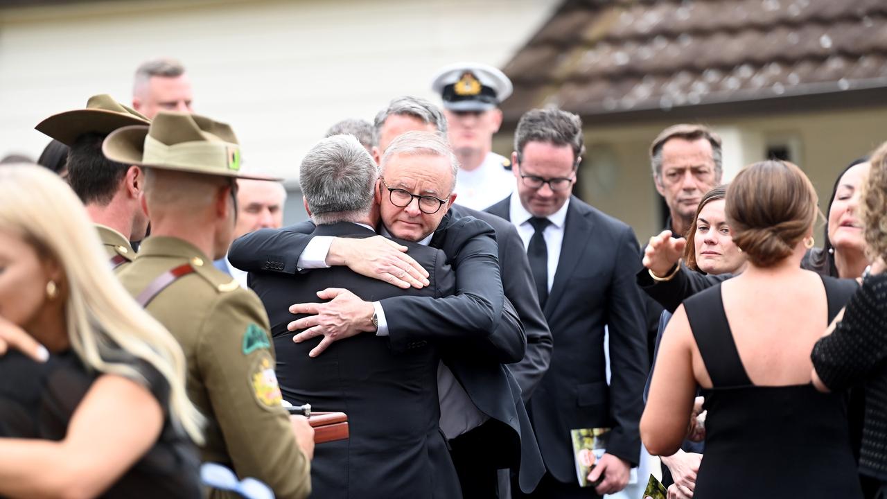 Prime Minister Anthony Albanese embraces former ministerial Joel Fitzgibbon at the funeral of his son Lance Corporal Fitzgibbon. Picture: NCA NewsWire / Jeremy Piper