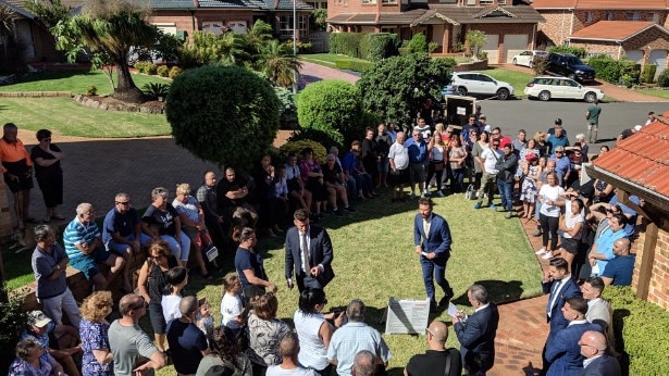 The auction for 5 Kirkton Place, Edensor Park, Sydney attracted quite a crowd.