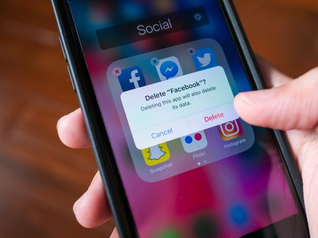 Facebook user deleting Facebook on an iPhone 7. Picture: Supplied