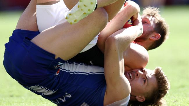 Cameron Zurhaar tackles Dyson Heppell during the first quarter. Picture: Michael Klein