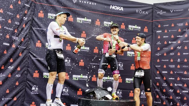 Winners on the podium at the Ironman 70.3 Tasmania in Hobart on Sunday 4th February 2024. L-R Mitch Kibby 2nd, Nick Thompson 1st, and Cam Wurf third. Picture: Linda Higginson
