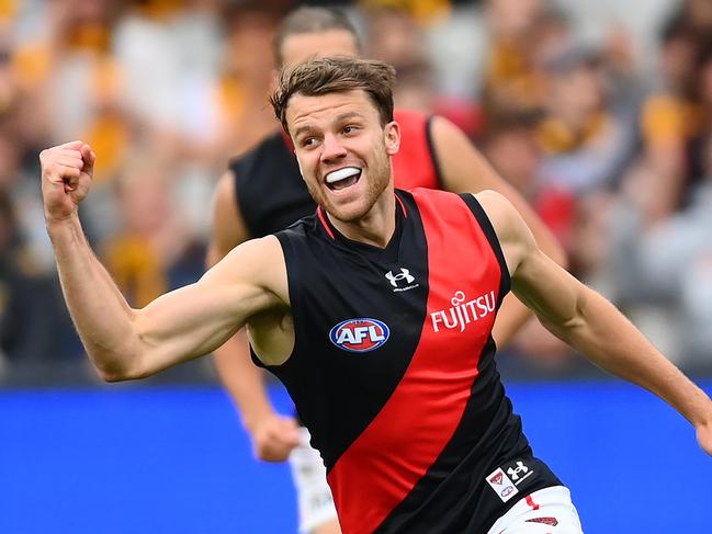 MELBOURNE, AUSTRALIA - MARCH 19: Jordan Ridley of the Bombers celebrates kicking a goal during the round one AFL match between Hawthorn Hawks and Essendon Bombers at Melbourne Cricket Ground, on March 19, 2023, in Melbourne, Australia. (Photo by Quinn Rooney/Getty Images)